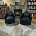 Modern Swivel Rocker Accent Chair Armchair Round Swivel Barrel Chair, 360° Rotating and Glide Back and Forth, Black PU Leather Set of 2