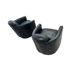 Modern Swivel Rocker Accent Chair Armchair Round Swivel Barrel Chair, 360° Rotating and Glide Back and Forth, Black PU Leather Set of 2